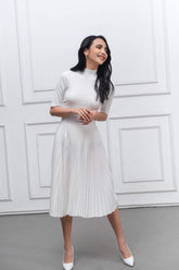 High-waisted pleated midi skirt in breathable lightweight silk fabric for effortless elegance